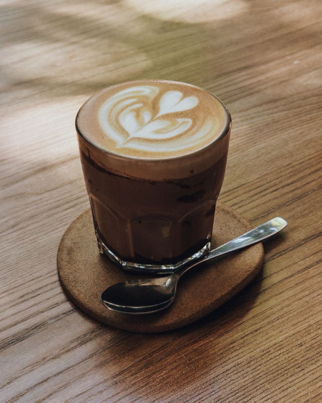 A flat white in a ceramic cup